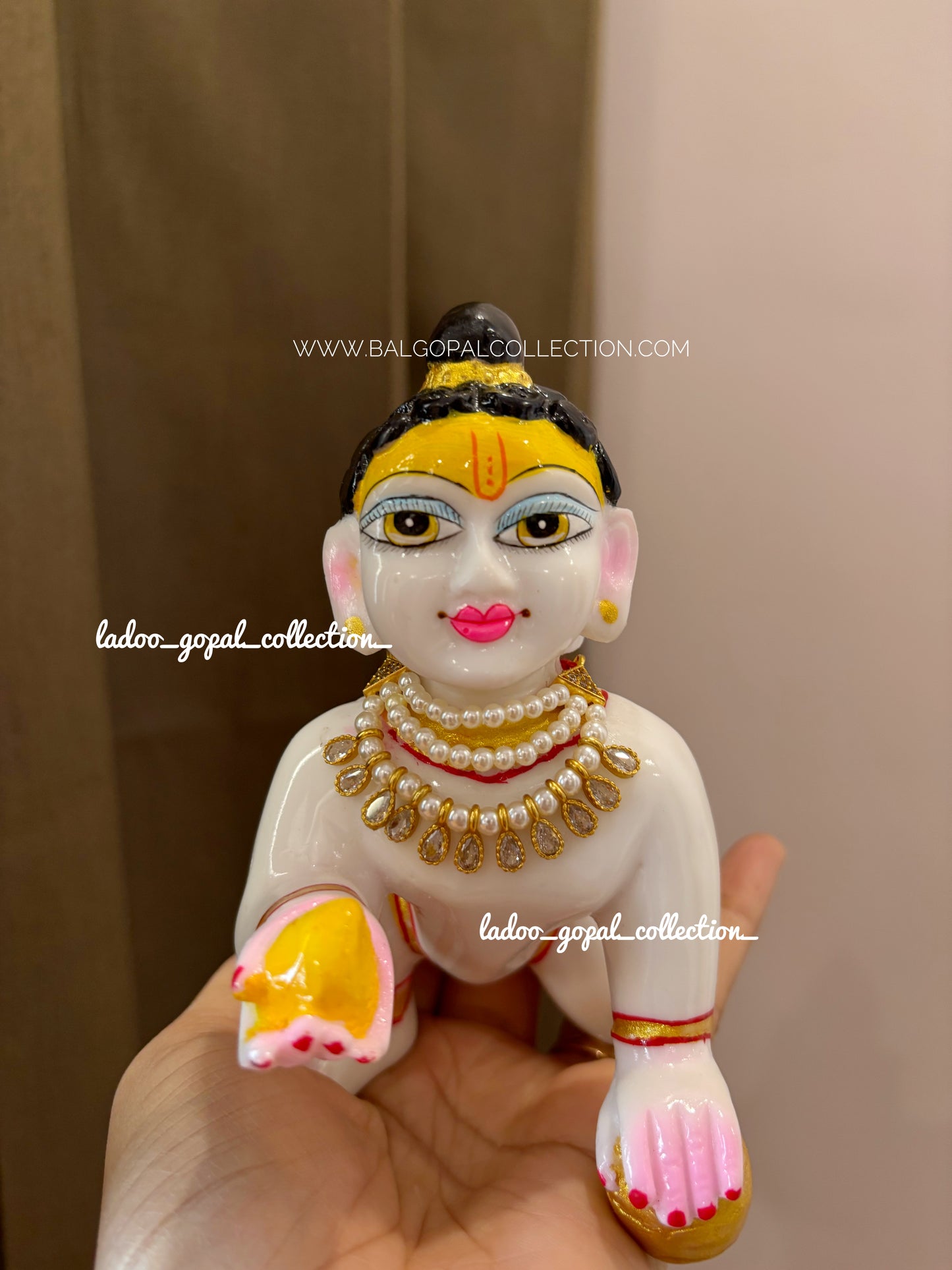 Affordable Moti AD mala for laddu gopal